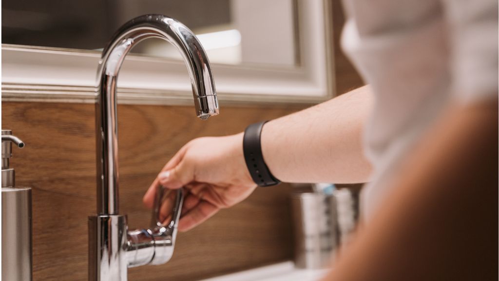 septic owner conserving water while washing hands